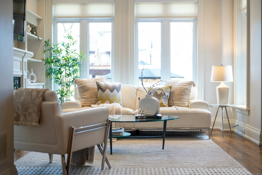 A bright living room with warm, neutral furnishings